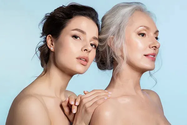 A younger and an older woman with full faces and lips show the amazing results of their botox injection treatments from Vida Integrative Health of Miami in Miami.